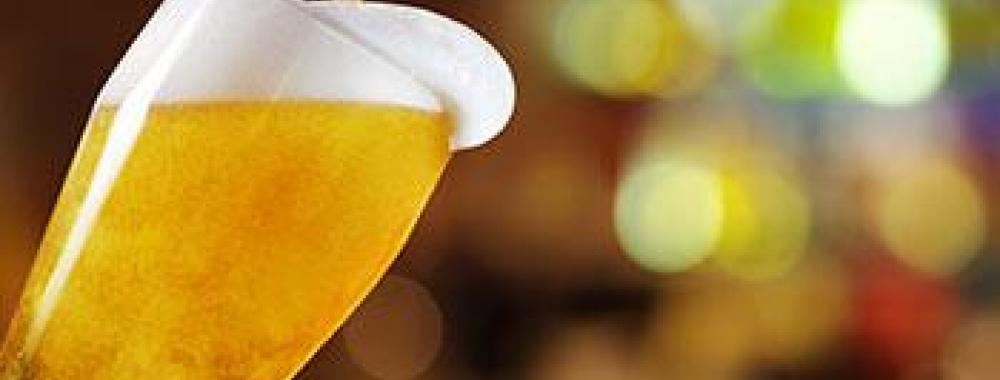 pouring beer into glass