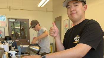 UC Davis Pre-College student prepares to roast coffee beans