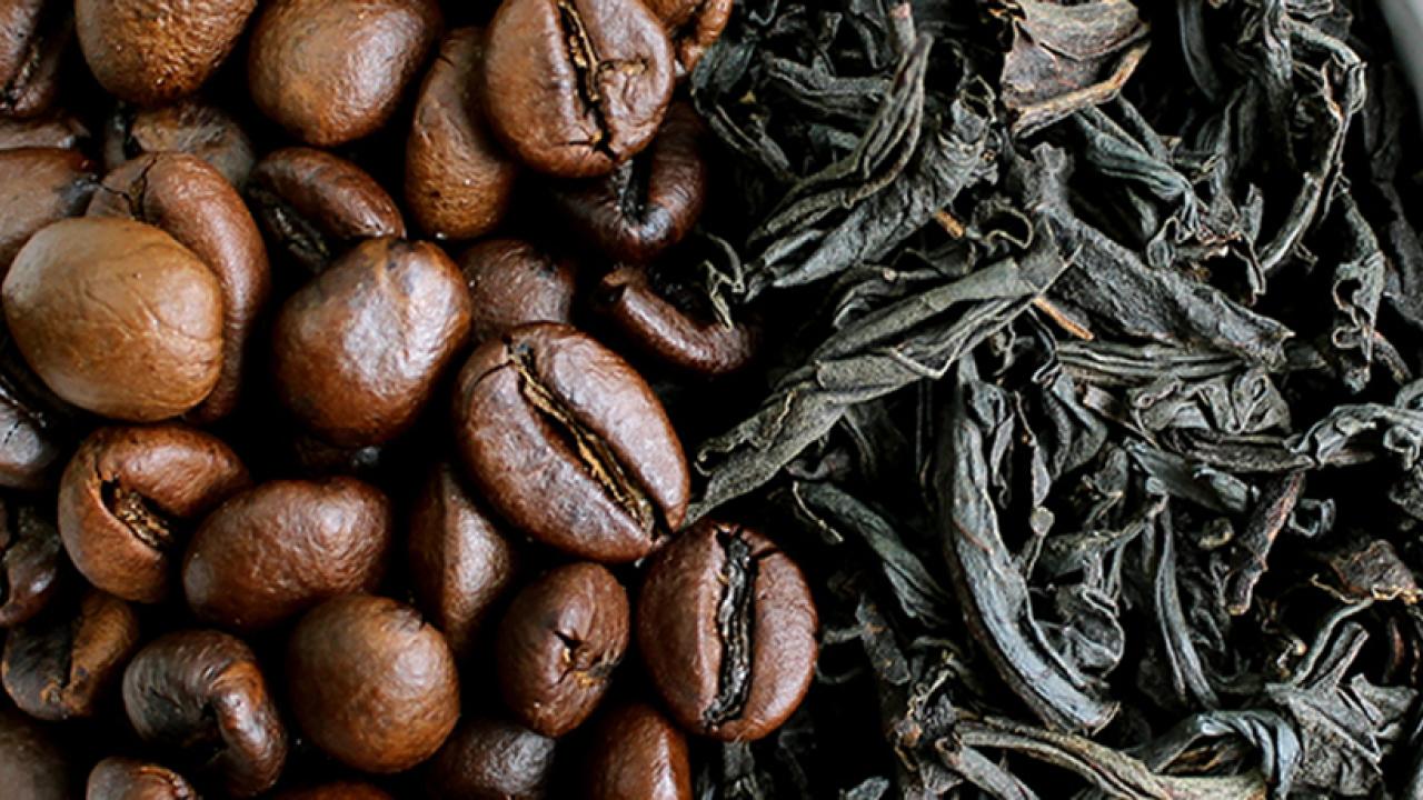 bowl of coffee beans and tea leaves