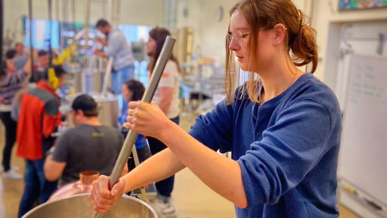 Master Brewer Ava Kemper mashing in on the Nanobrewhouse at Anheuser Busch InBev Pilot Brewery