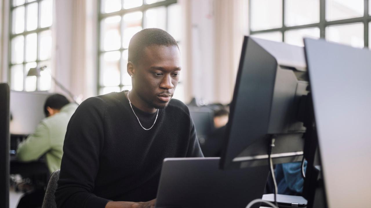 man working on computer