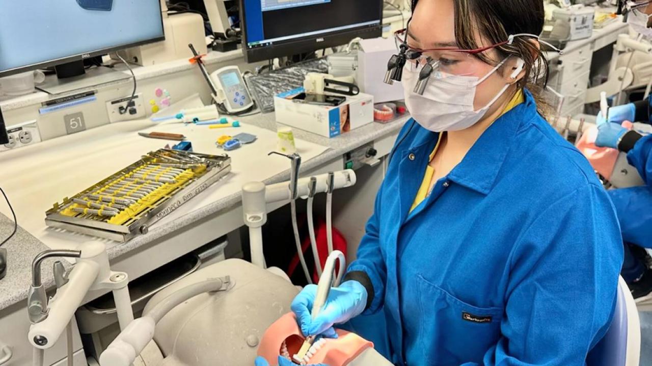 Health professions post-bac grad Monneca Rim practices a crown pep in dental school