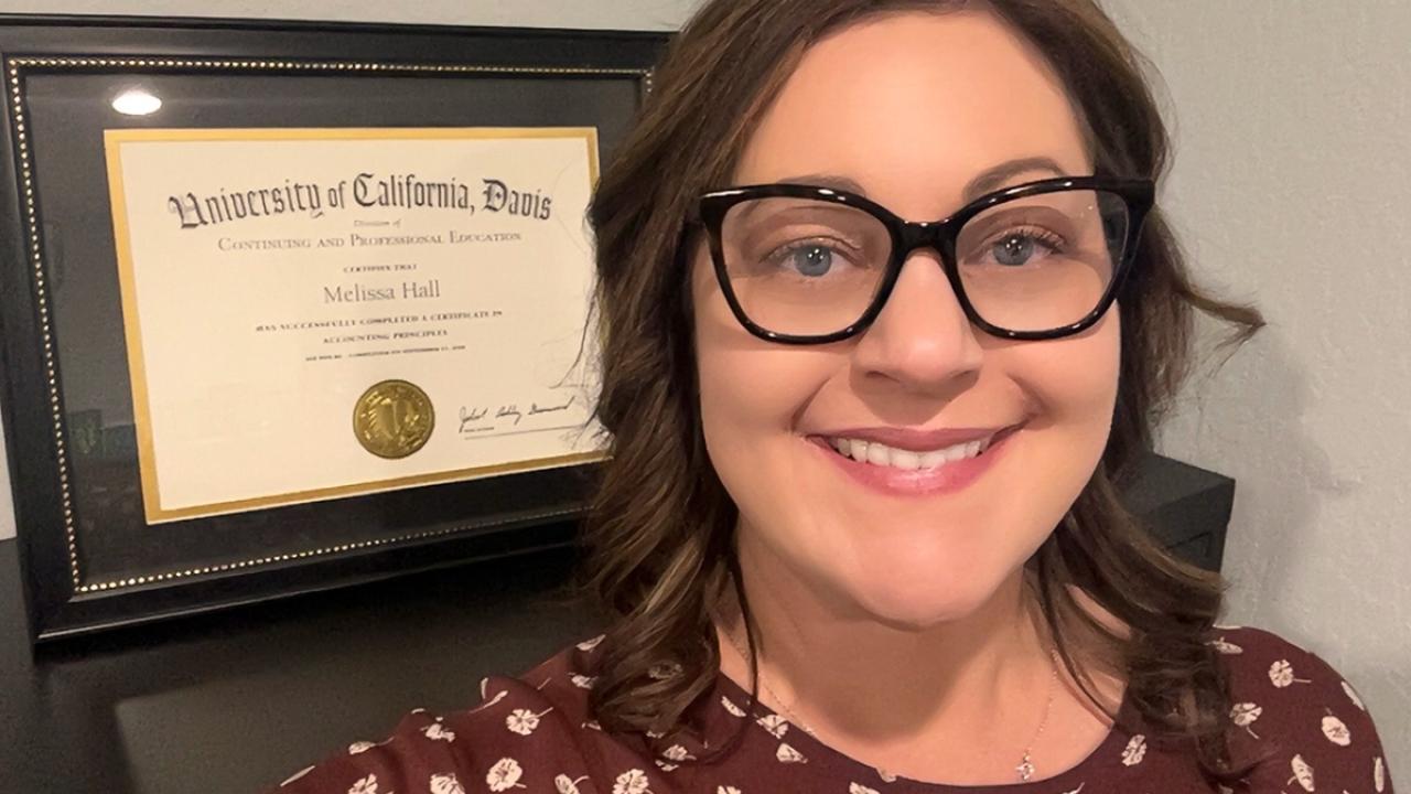 headshot of UC Davis CPE Accounting Program grad Melissa Hall poses with her certificate
