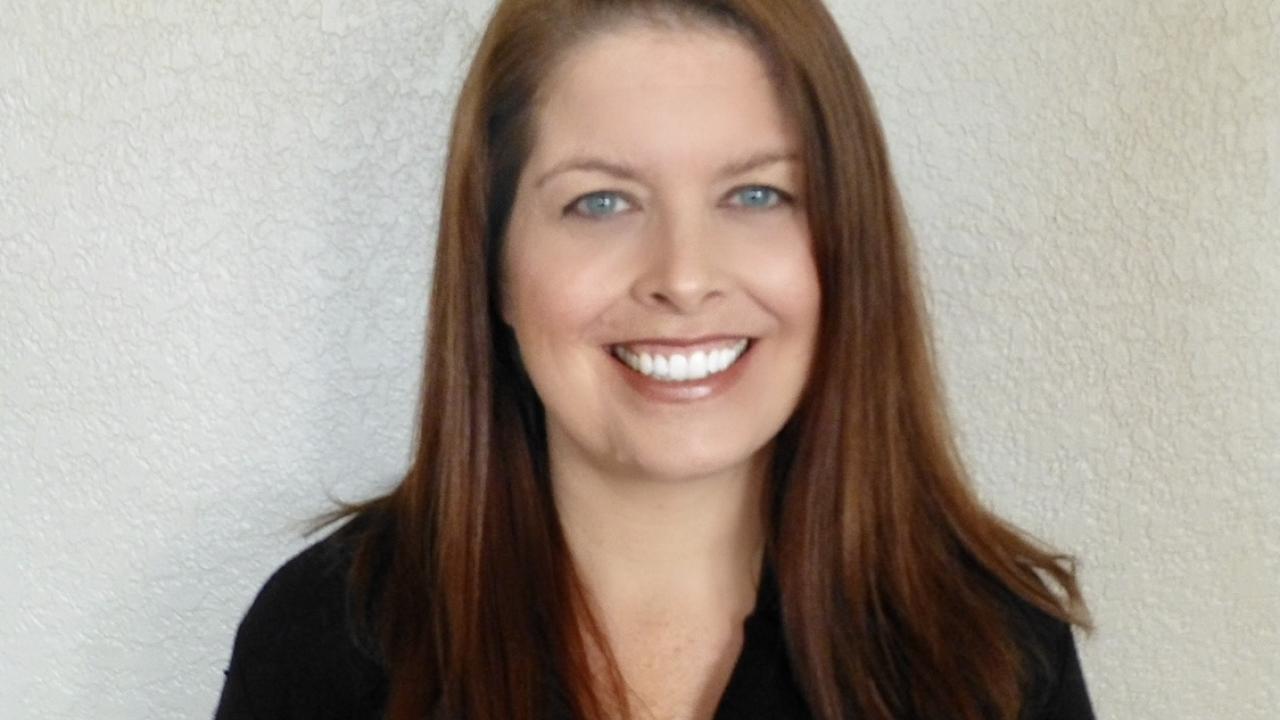 A headshot of Stefanie V. Plaumann.