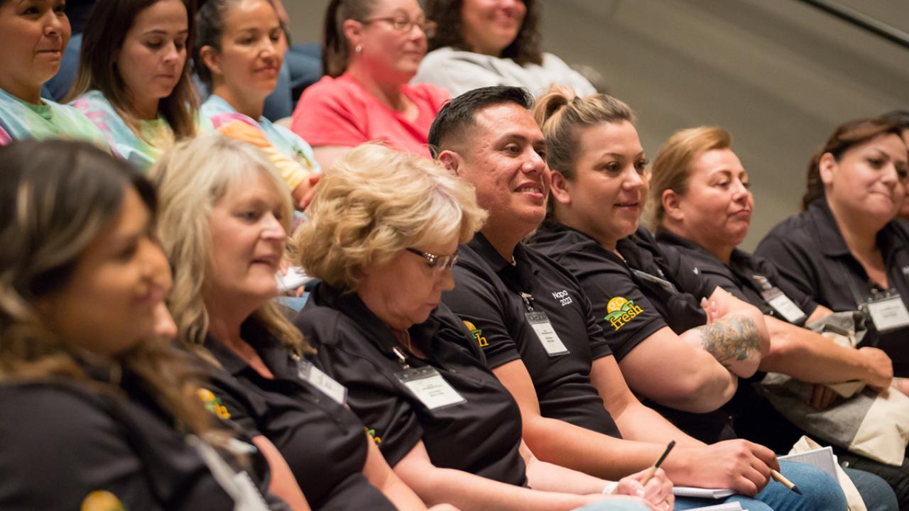 food professionals from California school districts sit and listen to a presentation during a training event