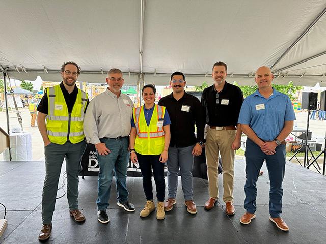 UC Davis CPE Construction Management Certificate Program grad Camilo Renteria poses with the national board members of the Construction Industry Education Foundation