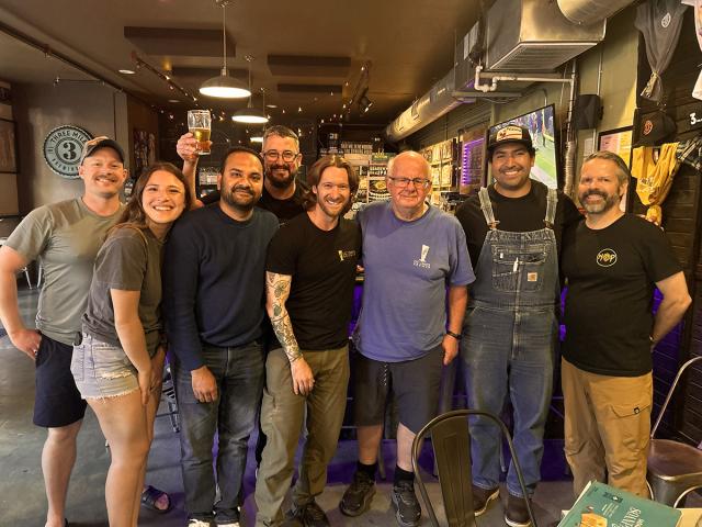 Master Brewers Program bootcamp participants pose with Charlie Bamforth