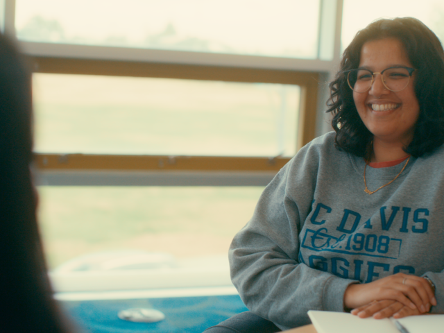 Post-Bac Student, Sahara, sitting with Post-Bac Advisor