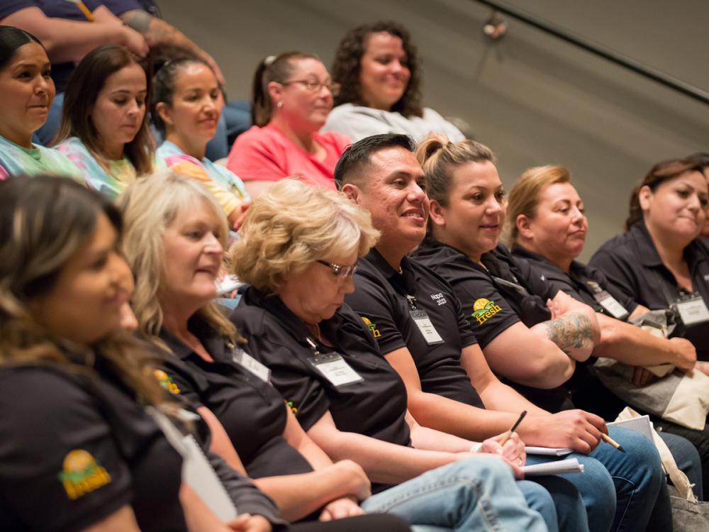 food professionals from California school districts sit and listen to a presentation during a training event