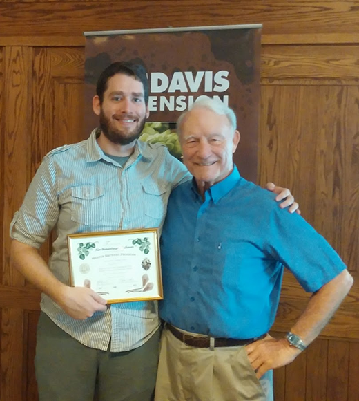 Professor Michael Lewis awarding Alan his Master Brewers Certificate