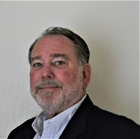 headshot of Patrick Greer