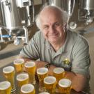 online beer quality instructor Charlie Bamforth in front of beer glasses