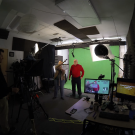 Charlie Bamforth filming in studio