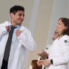 UC Davis Health Professions post-bac grad Francisco Cordero receives his white coat