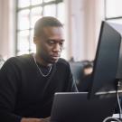 man working on computer