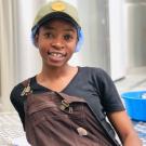 Tapping Potential Scholarship winner Tapiwa Charosa poses in Kweza Brewery