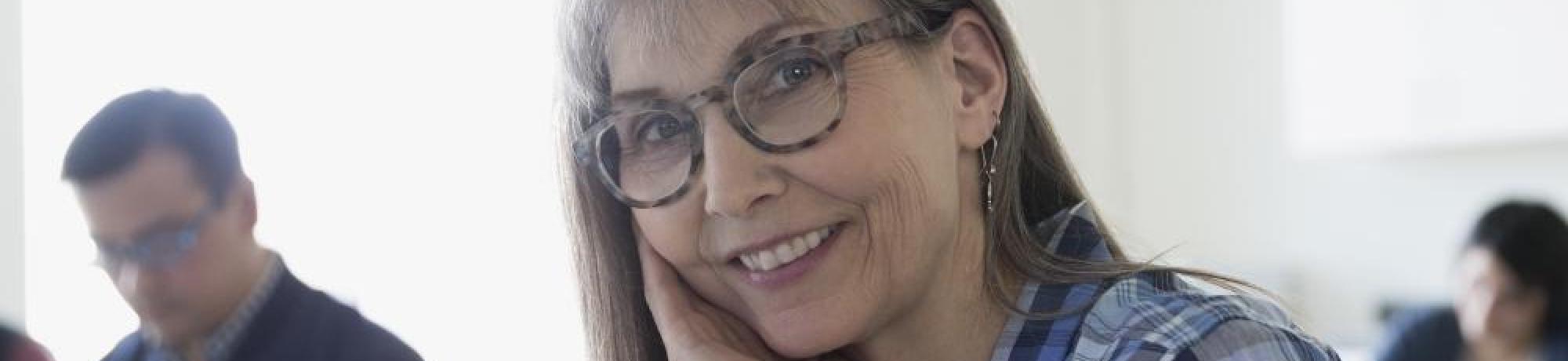 middle-aged woman smiling at camera