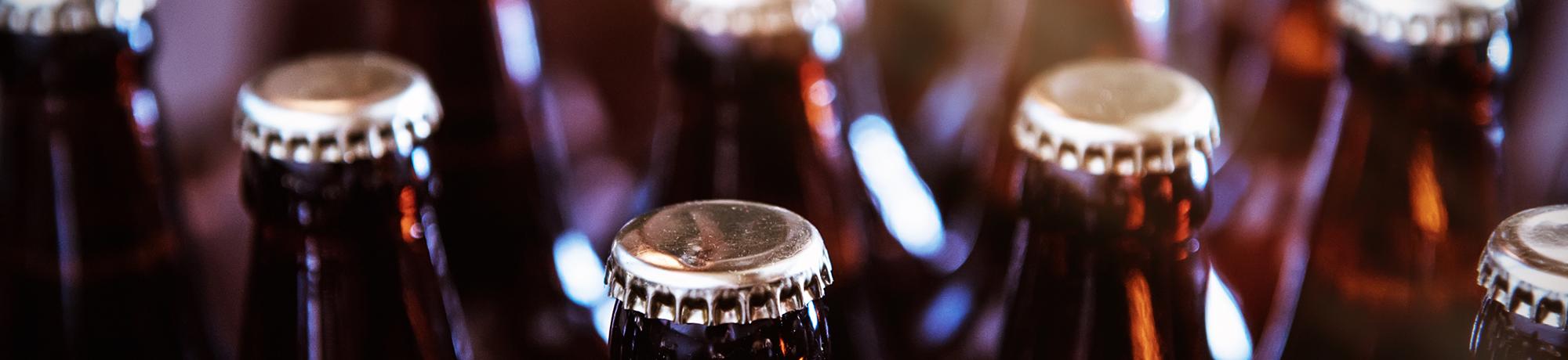close up of beer bottles